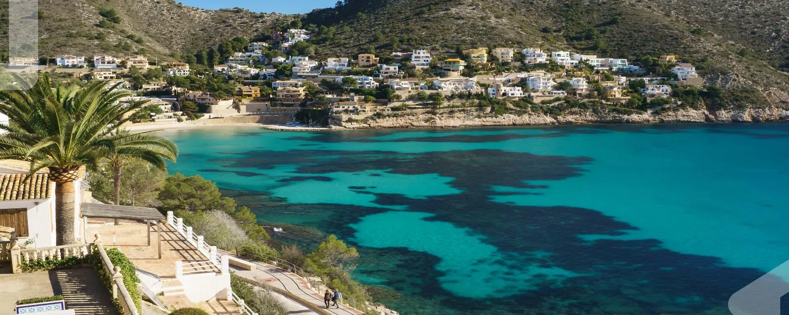Sunny turquoise bay of El Portet, Moraira, on the Costa Blanca